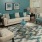a living room with a couch and chairs